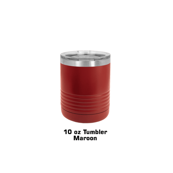 A red can sitting on top of a green background.