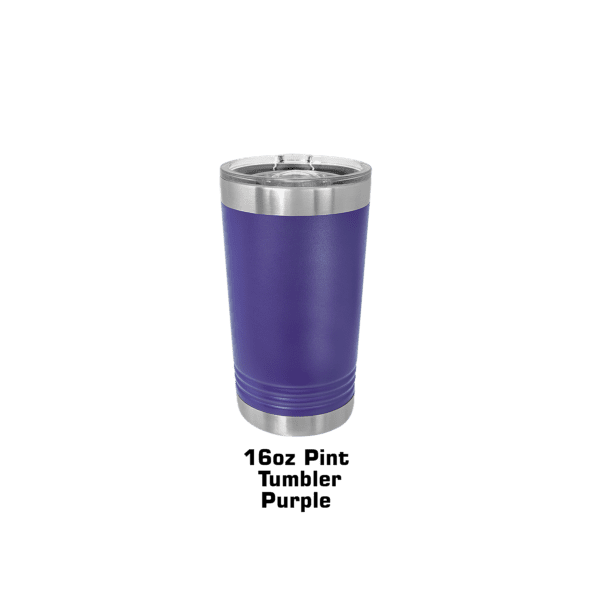 A purple cup is sitting on the ground.