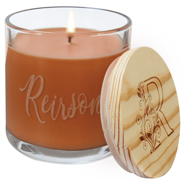 A candle with the name of reirson on it.